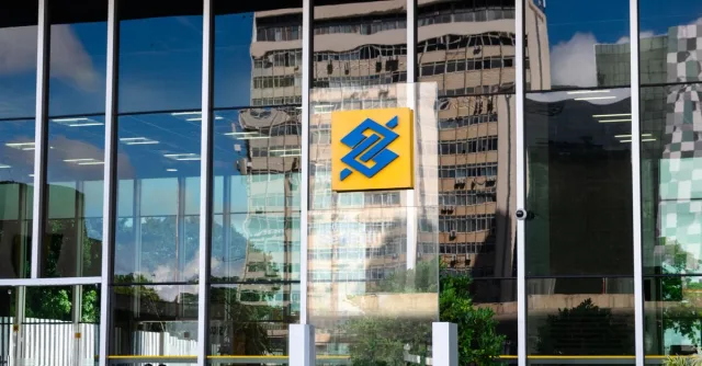 Modern building exterior in Brasília, Brazil, featuring reflective glass and iconic Banco logo.