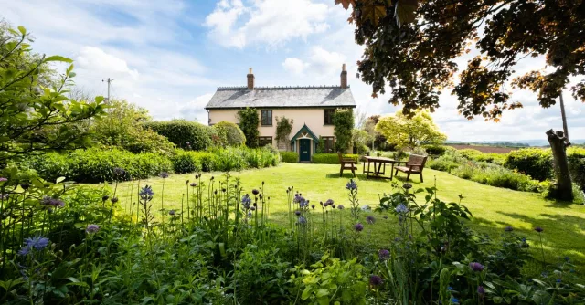 Serene countryside view of a traditional house in Hereford, England.