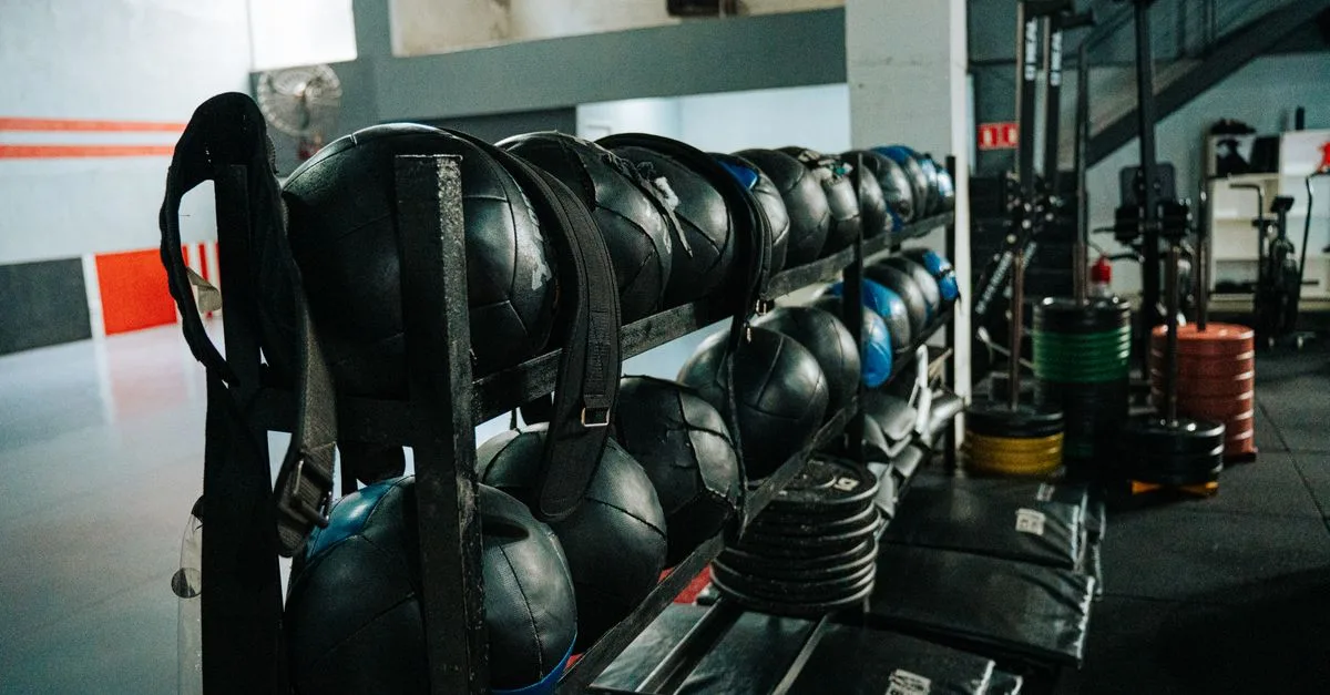 Well-equipped indoor gym featuring kettlebells, weights, and workout gear, perfect for fitness enthusiasts.