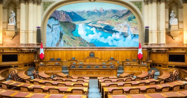 Interior view of the Swiss Parliament Building in Bern, showcasing its grandeur and Swiss heritage.