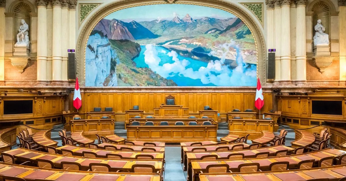 Interior view of the Swiss Parliament Building in Bern, showcasing its grandeur and Swiss heritage.