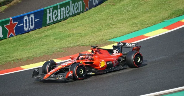 Ferrari Formula 1 car racing on a track during a Grand Prix event.