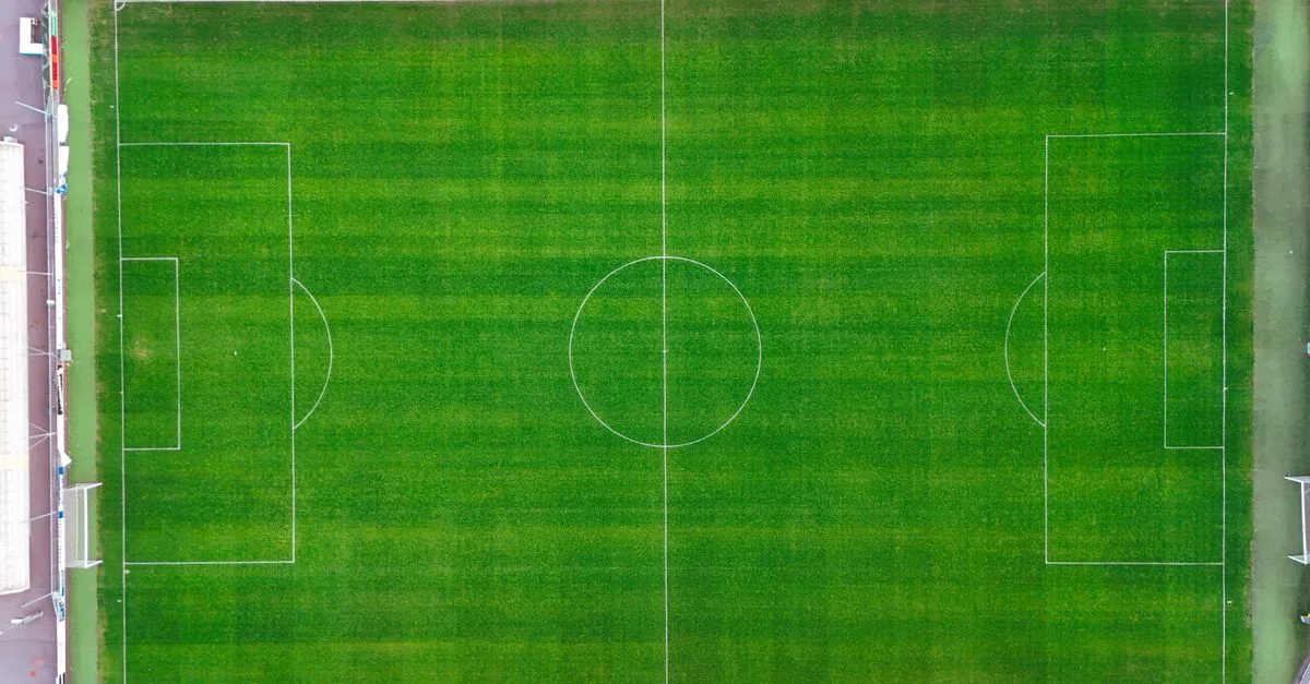 Top view of a green soccer field in Jonkoping, Sweden. Ideal for sports and aerial photography themes.
