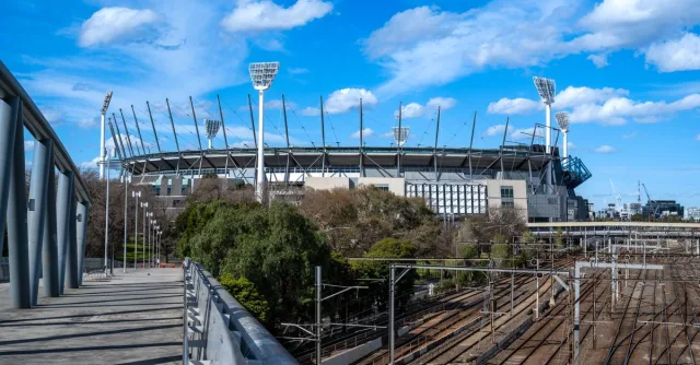 Capture of Melbourne Cricket Ground with railway yard and blue sky in Richmond, Victoria.