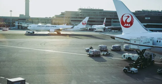 Japan Airlines planes on the tarmac at Narita International Airport in Chiba, Japan.