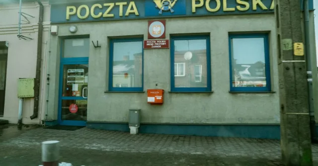 Image of Poczta Polska post office building in Ząbkowice Sląskie, Poland on a snowy day.