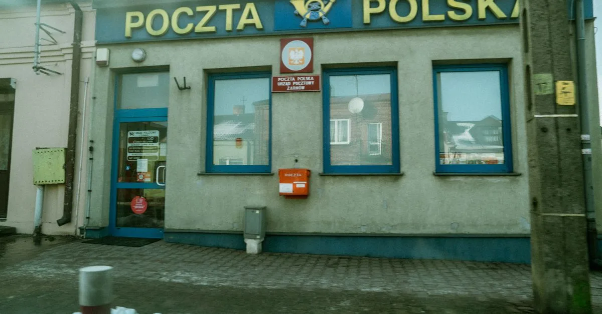 Image of Poczta Polska post office building in Ząbkowice Sląskie, Poland on a snowy day.