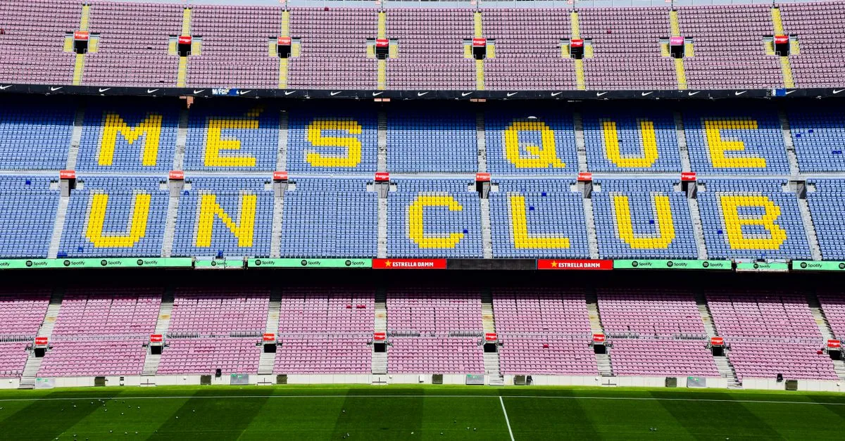 The iconic "Mes Que Un Club" slogan displayed at the Camp Nou stadium in Barcelona, Spain.