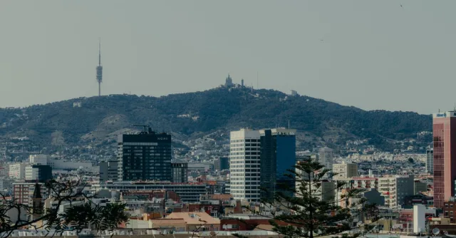 Scenic view of Barcelona skyline featuring Tibidabo Mountain and Collserola Tower.
