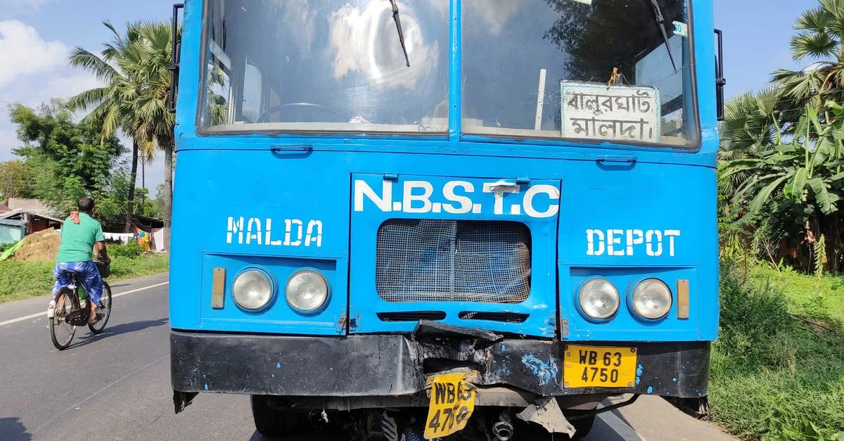 A bus accident on a sunny day in Lakshmipur, India, involving a motorbike.