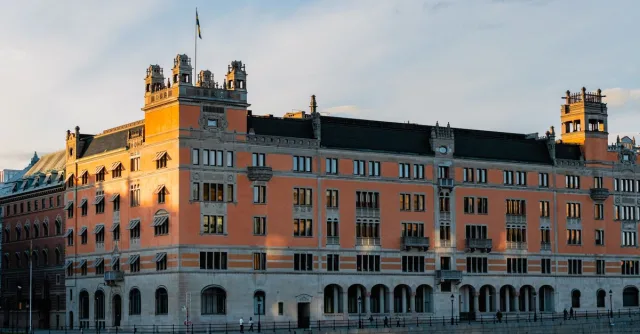Captivating view of the historic Swedish Parliament building in Stockholm during sunset.