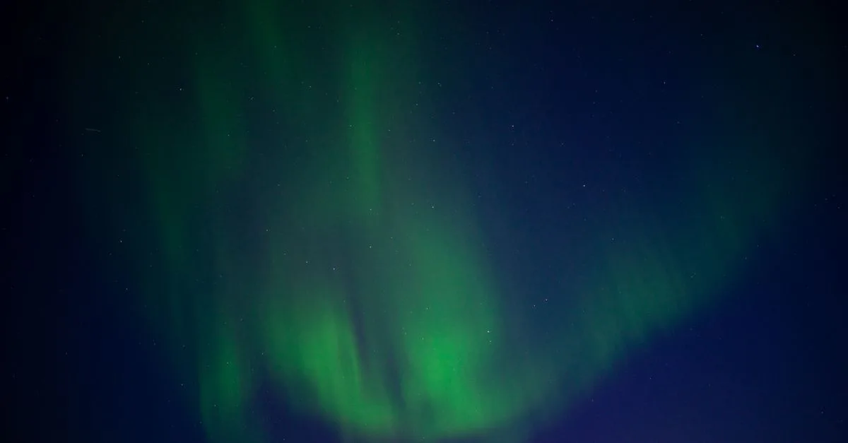 Stunning Aurora Borealis illuminating the night sky in Karasjok, Norway.