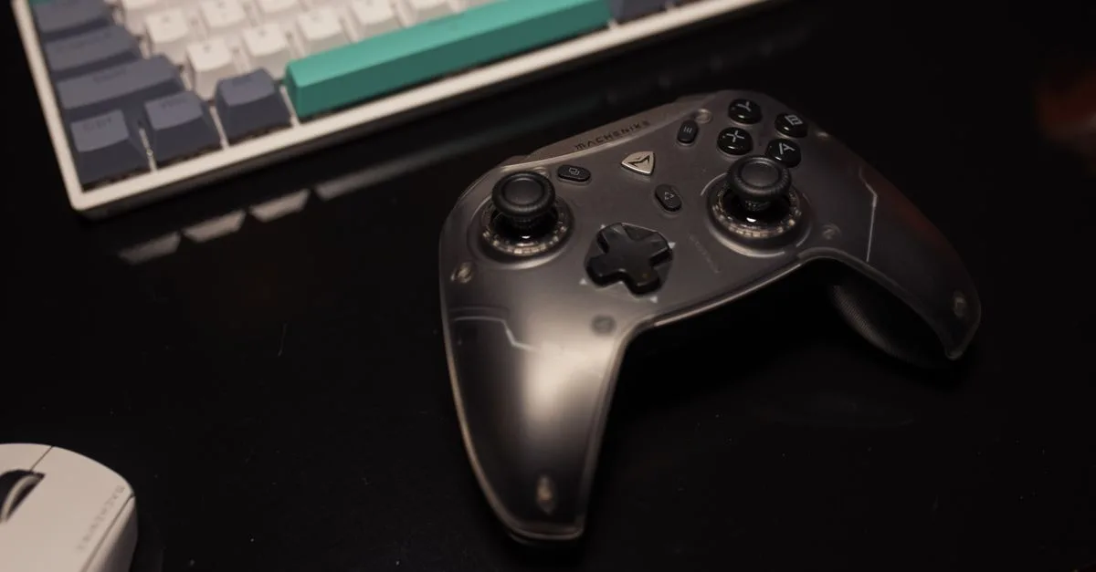 Close-up of a gaming controller on a desk with a keyboard and mouse, perfect for gamers.