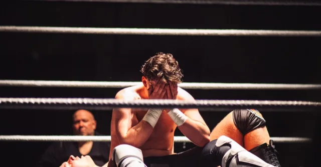 Intense wrestling scene showcasing the emotion and athleticism of the sport.