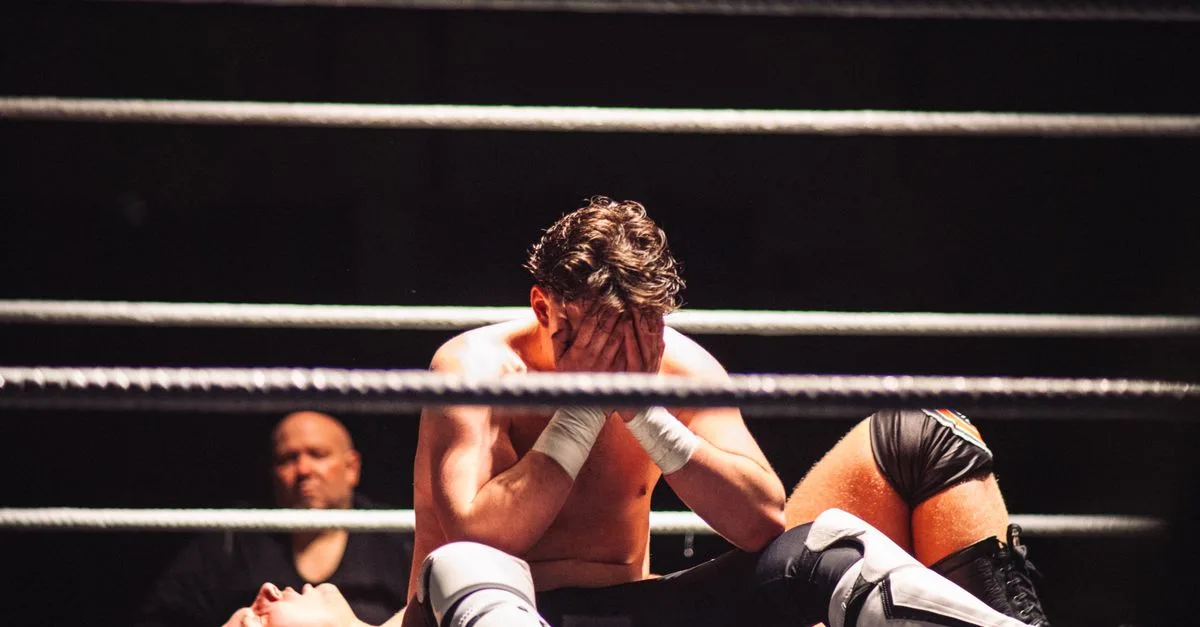 Intense wrestling scene showcasing the emotion and athleticism of the sport.