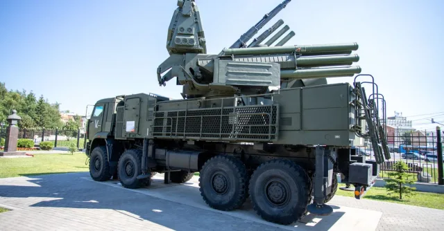Outdoor display of a military missile defense system on a sunny day, highlighting its structure.