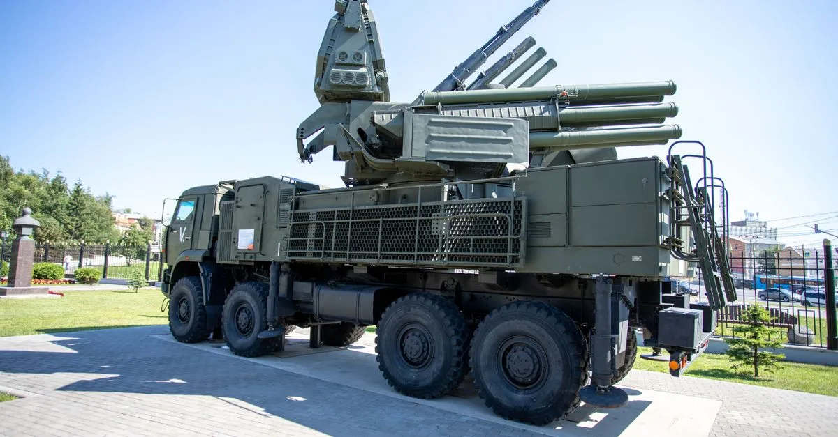 Outdoor display of a military missile defense system on a sunny day, highlighting its structure.