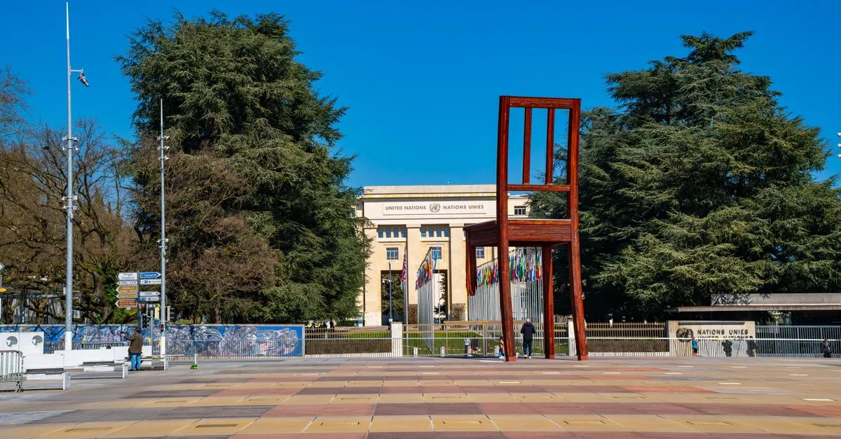 Iconic Broken Chair sculpture near UN building in Geneva.