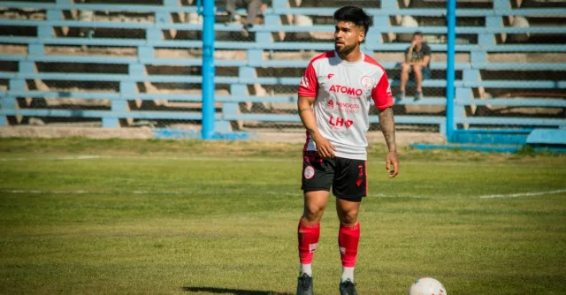 A soccer player in action on a sunny day in Mendoza, Argentina.