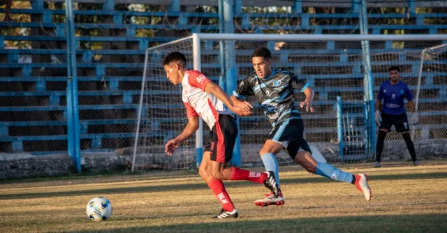 Footballers in action during a lively soccer match on a sunny day. Perfect for sports imagery.