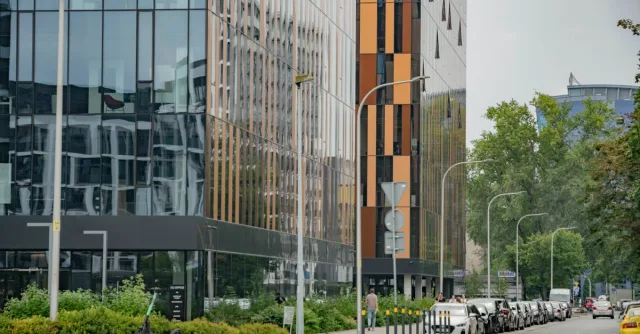 Contemporary office architecture with glass reflections in Wrocław, Poland.