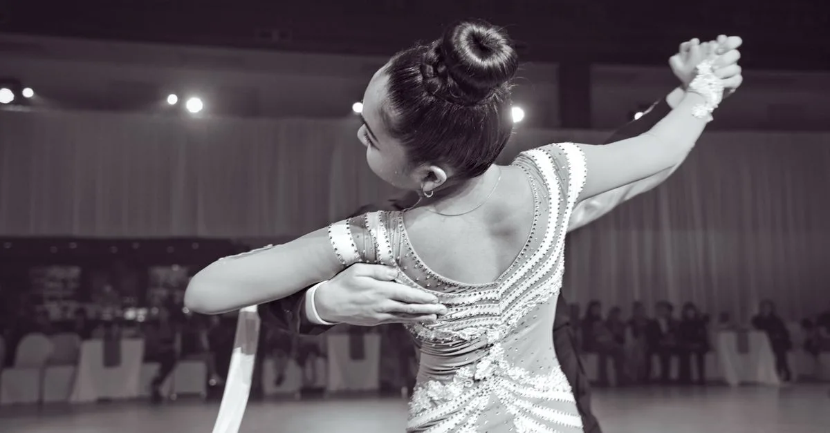 Graceful ballroom dance performance capturing elegance and skill, indoors in Vancouver.