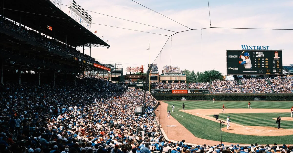 Panoramic view of a bustling baseball game at Wrigley Field, Chicago, capturing the vibrant atmosphere.