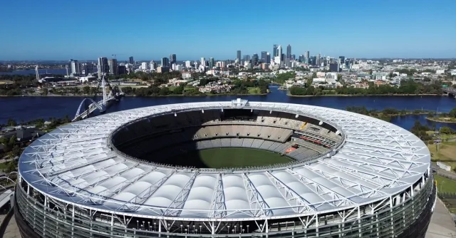 Stunning aerial view of Optus Stadium in Perth, Western Australia with city skyline backdrop.