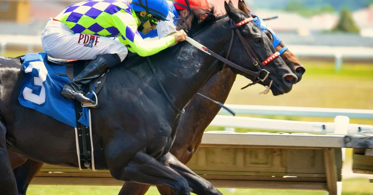 Intense horse race with jockeys competing in Shakopee, MN, USA.