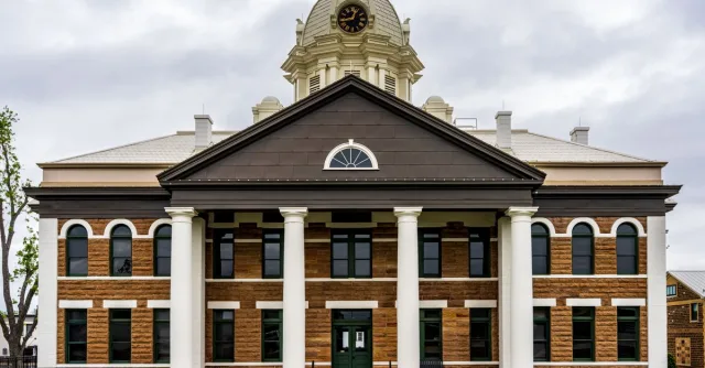 Front view of the historic Mason County Courthouse in Mason, Texas, USA.