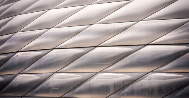 Detailed view of Allianz Arena showing its modern, geometric architectural elements in Munich, Germany.