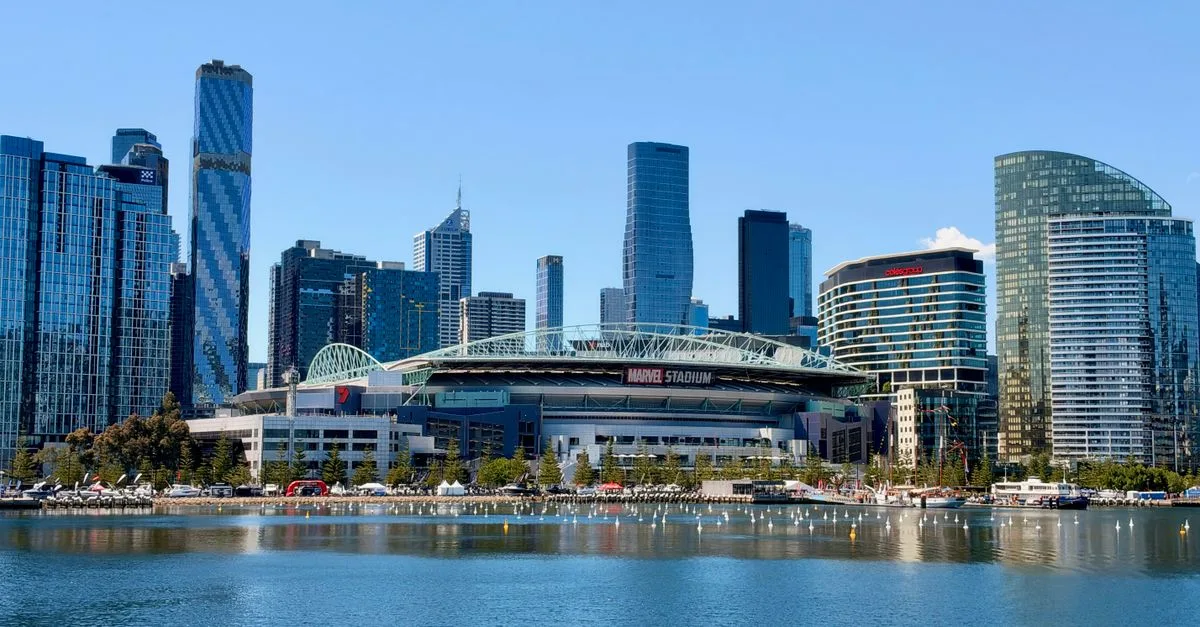 Vibrant view of Melbourne skyline featuring Marvel Stadium, Docklands, Victoria, Australia.