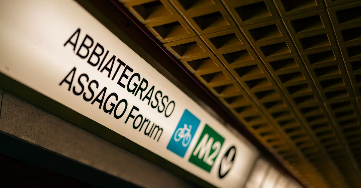 Close-up of Abbiategrasso Assago Forum metro sign in Milan, Italy.