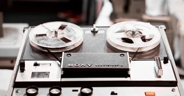 Close-up of a vintage Sony reel-to-reel tape recorder, highlighting classic audio technology.
