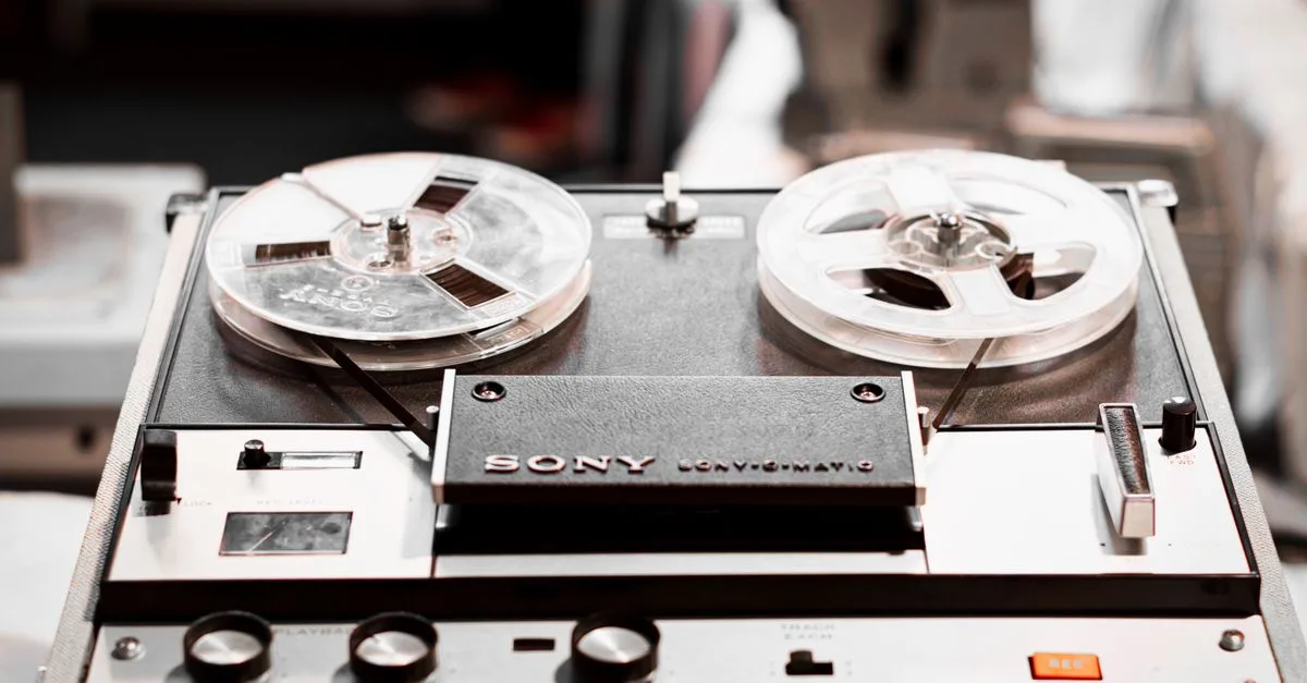 Close-up of a vintage Sony reel-to-reel tape recorder, highlighting classic audio technology.