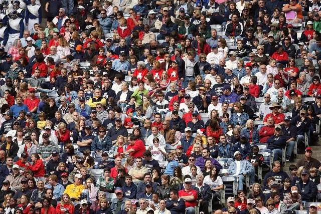 A wide shot of a professional football stadium during a match.