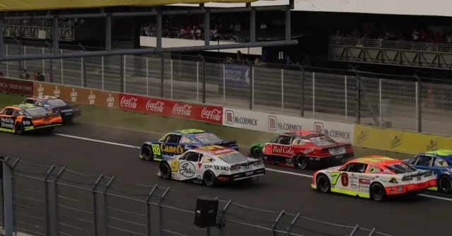 Thrilling NASCAR event at Mexico City with colorful race cars and dynamic action on the track.