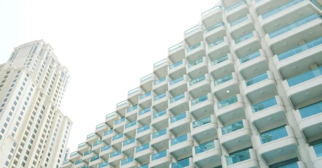 Overview of modern high-rise residential buildings in Dubai, emphasizing urban architecture.