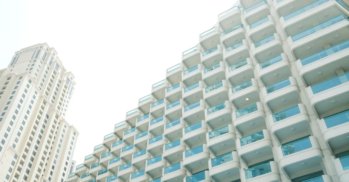 Overview of modern high-rise residential buildings in Dubai, emphasizing urban architecture.
