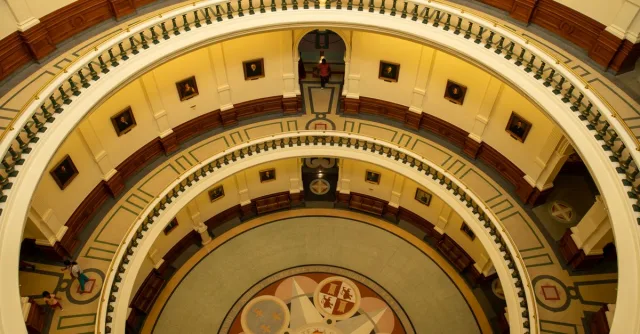 High angle view of the neoclassical ornate interior of the Texas State Capitol in Austin, Texas.