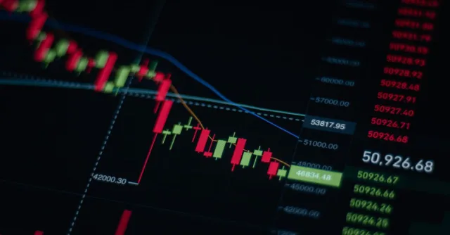 Close-up of stock market chart showing trends and data on a digital screen.