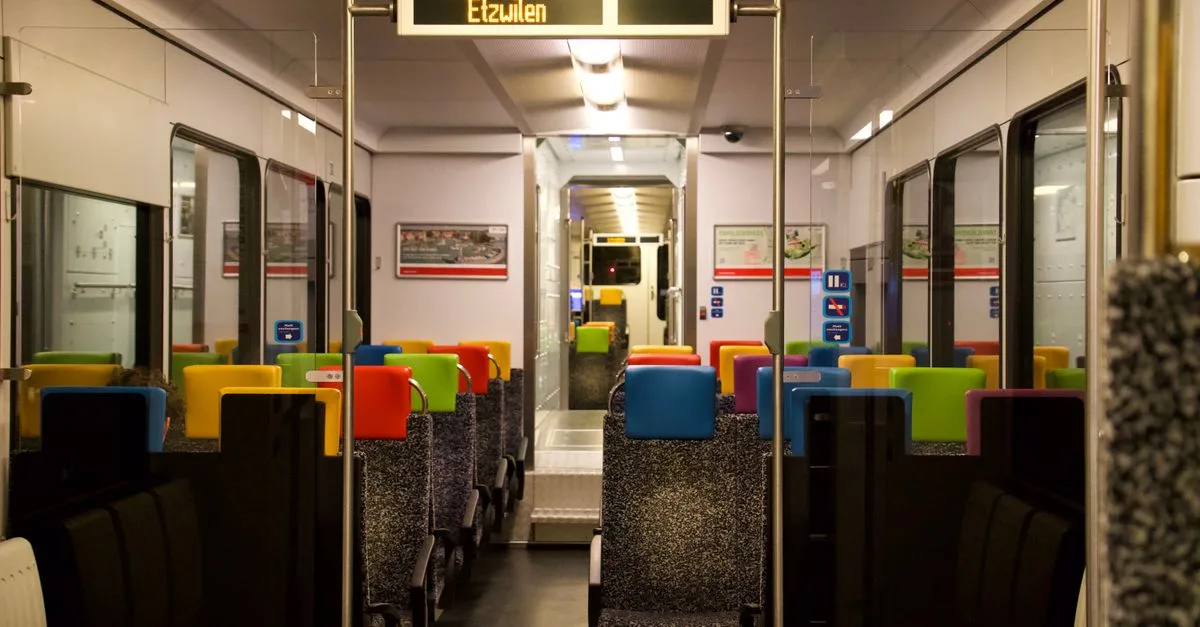 Vibrant seats inside a modern Swiss train in Etzwilen, Switzerland.