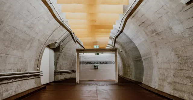 Concrete underground passage with modern lighting in Zurich, Switzerland.