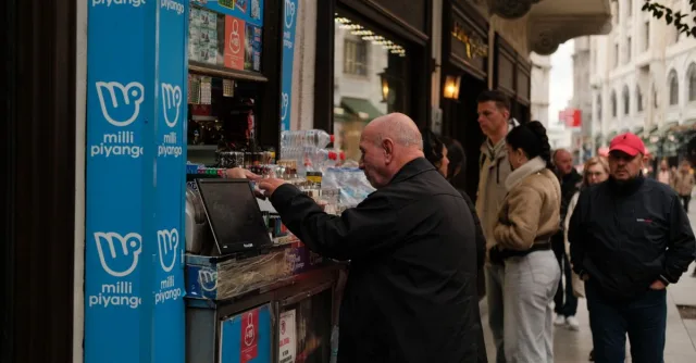 People buying lottery tickets and beverages from a street vendor on a bustling urban street.