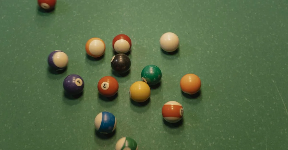 A top view of scattered colorful billiard balls on a pool table, ideal for gaming themes.