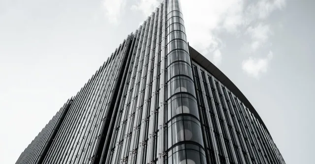 A sleek and modern high-rise building exterior photographed in London, England.