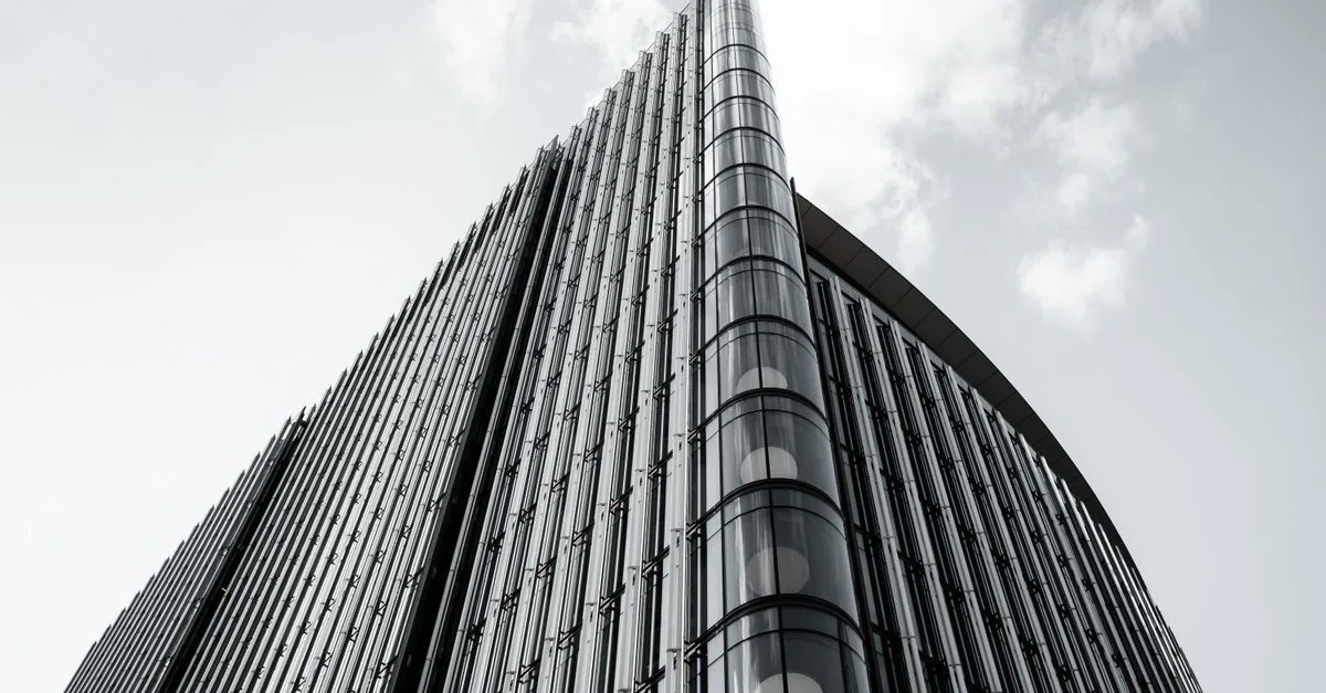 A sleek and modern high-rise building exterior photographed in London, England.