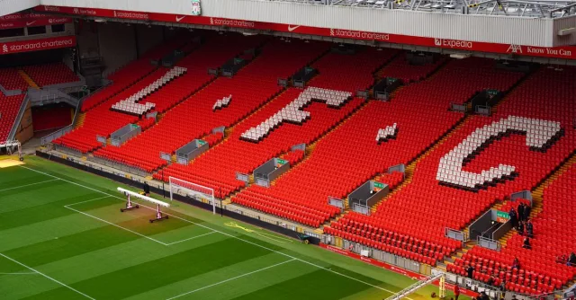 View of Anfield Stadium seating with prominent LFC letters. Perfect capture of iconic Liverpool FC venue.