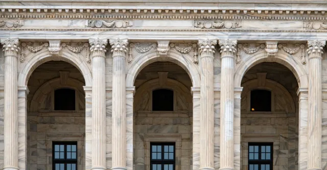 Close-up of the ornate archways and columns at the Minnesota State Capitol building.