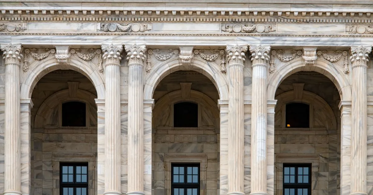 Close-up of the ornate archways and columns at the Minnesota State Capitol building.